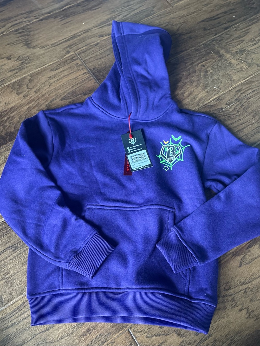 Kids Purple Hooded Sweatshirt spooky collection with Crest Logo
